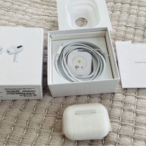 Apple AirPods Pro with White Charging Case and Cable